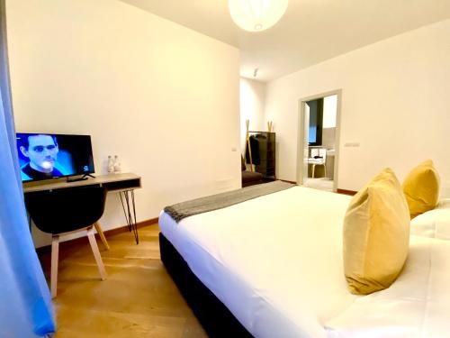 Postel nebo postele na pokoji v ubytování Palazzina B - Smart Rooms