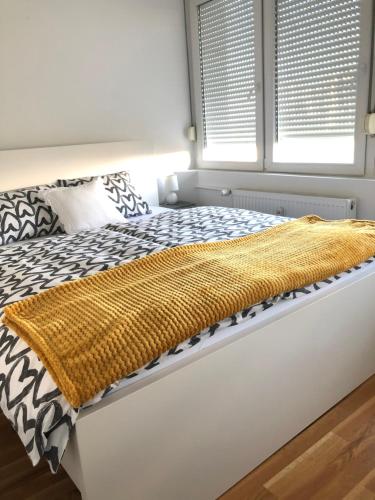 Postel nebo postele na pokoji v ubytování Apartment Mađor