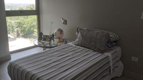Katil atau katil-katil dalam bilik di Seminario Suites Cozy Apart