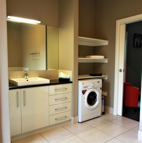 Η κουζίνα ή μικρή κουζίνα στο Barklysuites Apartments