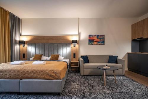 Posteľ alebo postele v izbe v ubytovaní Apartmán Drahokam Bešeňová