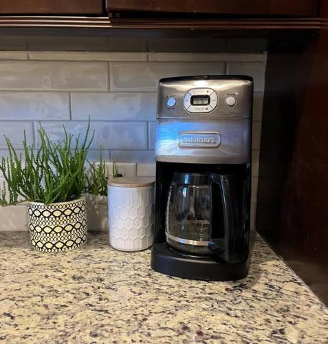 a coffee maker sitting on top of a counter at Trendy West Town Flat - 2 bed / 1.5 bath w parking in Chicago