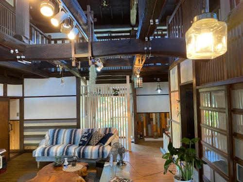 a living room with a couch and a table at hanare in Yamanashi