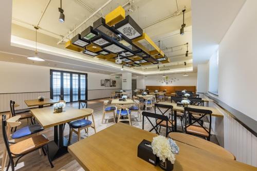 Ruang duduk di 银座精宿酒店 - 济南泺源大街泉城广场宽厚里店
