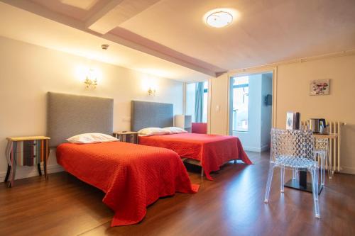 Postel nebo postele na pokoji v ubytování Hôtel Itzalpea