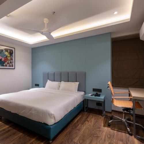 Ένα ή περισσότερα κρεβάτια σε δωμάτιο στο Hotel Regal Grand