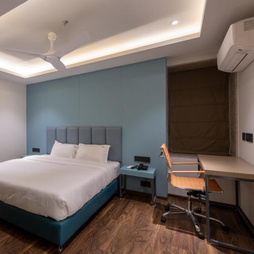 Ένα ή περισσότερα κρεβάτια σε δωμάτιο στο Hotel Regal Grand