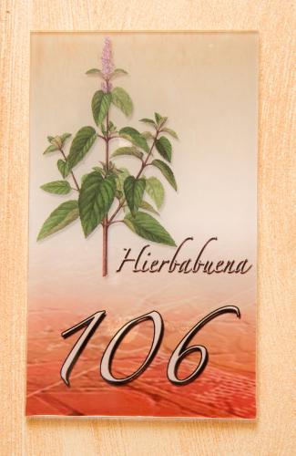 a painting of a tree with a flower on it at Hotel Rural El Arriero in La Zarza