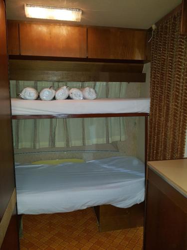 Letto o letti in una camera di Camping Onda Azzurra