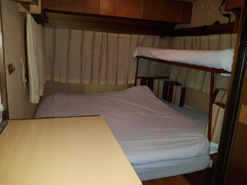Letto o letti in una camera di Camping Onda Azzurra