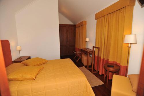 Säng eller sängar i ett rum på Casa D'Avo Beatriz