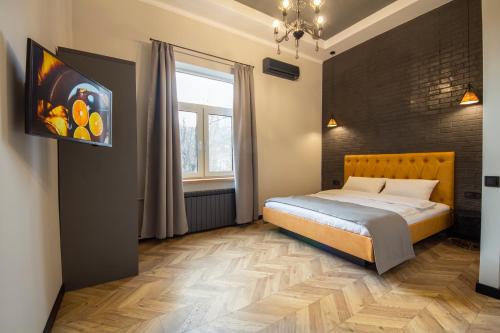 Кровать или кровати в номере Central Apartments Maidan Area