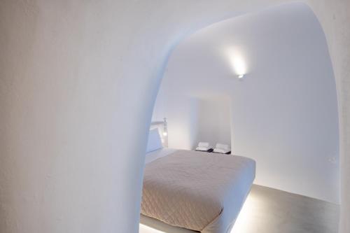 Ένα ή περισσότερα κρεβάτια σε δωμάτιο στο Oyster Luxury Suites