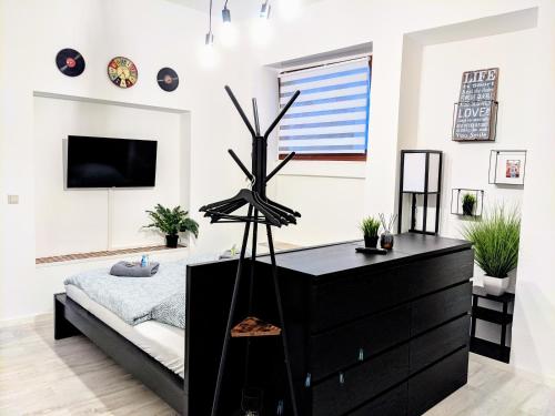 Postel nebo postele na pokoji v ubytování LENASTAY I Loft Chick - Innenstadt