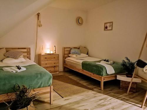 Кровать или кровати в номере Polne Zacisze