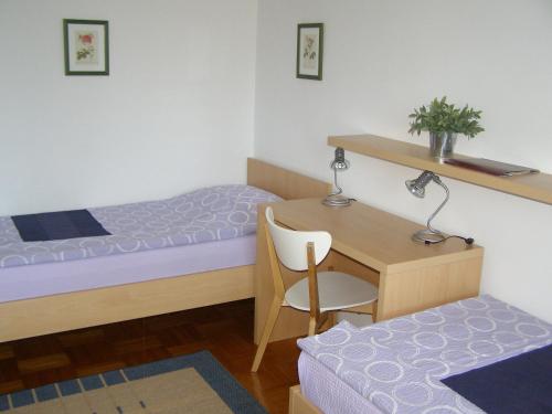 Cama o camas de una habitación en Apartments Dunoti