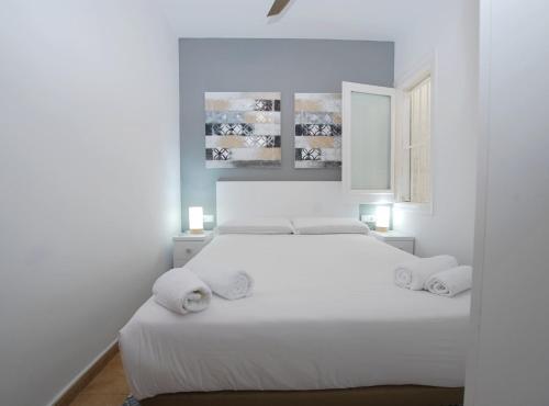 Cama o camas de una habitación en La Platgeta · La Platgeta · Ideal family apartment, with private terrace