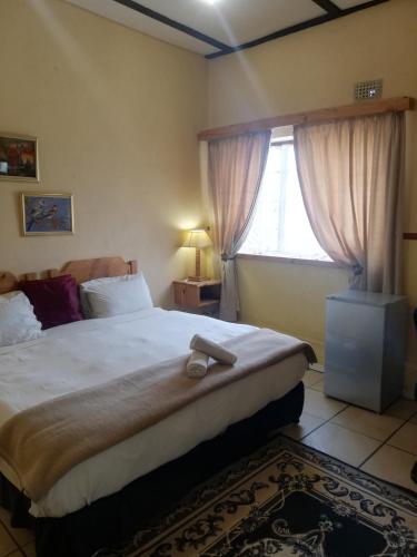 Katil atau katil-katil dalam bilik di The Old Mill Hotel