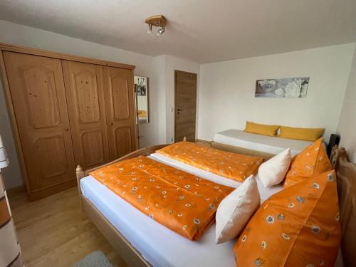 Postel nebo postele na pokoji v ubytování Ferienwohnung Grüntenblick