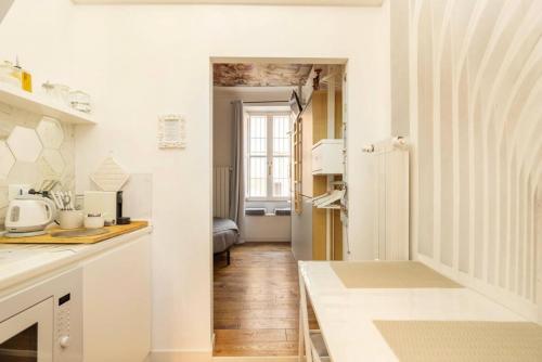 A bed or beds in a room at Carolina’SNest in Trastevere