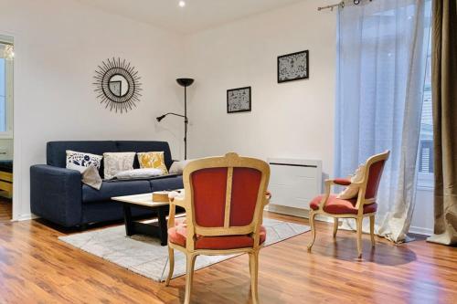 a living room with a couch and two chairs at In the heart of Grenoble #CO in Grenoble