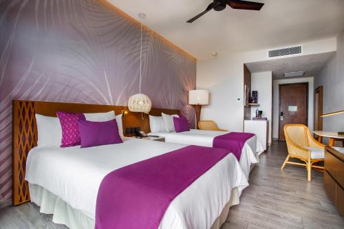 Postel nebo postele na pokoji v ubytování Armony Marival Resort & Spa Punta de Mita - MGallery collection
