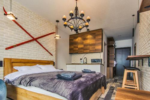 Η κουζίνα ή μικρή κουζίνα στο M25 Bakuriani, Apartment 415