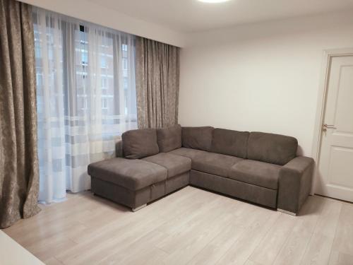 Ein Sitzbereich in der Unterkunft Apartament Lupeni/Straja