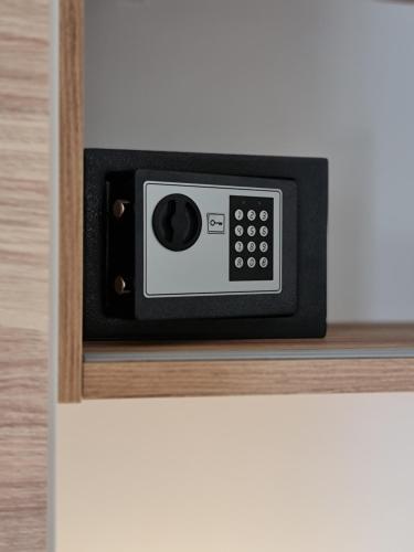 a microwave oven sitting on top of a wall at LUXURY MOBILE HOMES IVACI in Rovinj