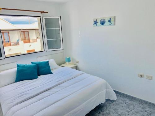 Ένα ή περισσότερα κρεβάτια σε δωμάτιο στο La garita beach B2
