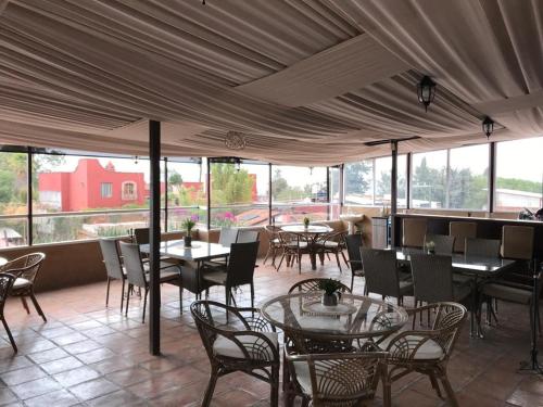 Casa de las Escaleras tesisinde bir restoran veya yemek mekanı