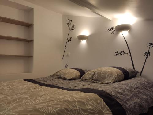 Postel nebo postele na pokoji v ubytování Superbe Duplex en plein cœur de Crépy-en-Valois