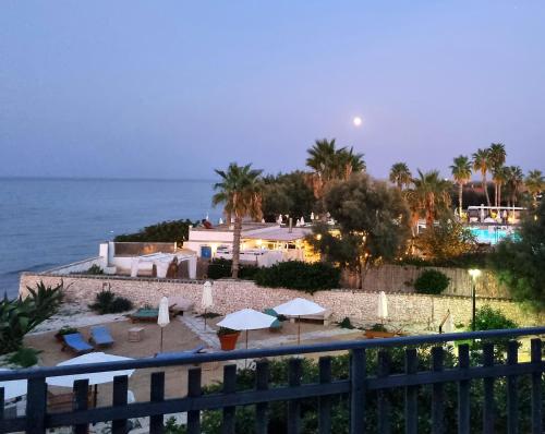 a view of a beach with umbrellas and the ocean at Aurelia Sea View in Torre Canne