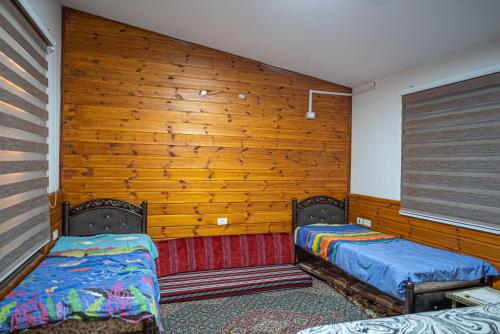 Postel nebo postele na pokoji v ubytování צימר נאשד