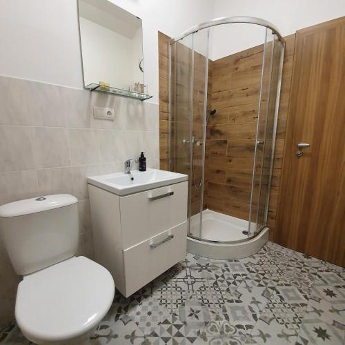Ванная комната в RED DEER Hotel