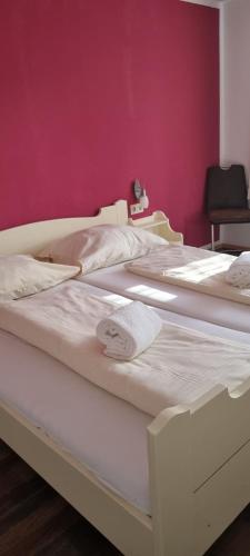 מיטה או מיטות בחדר ב-Pension – Restaurant Jägerwinkl