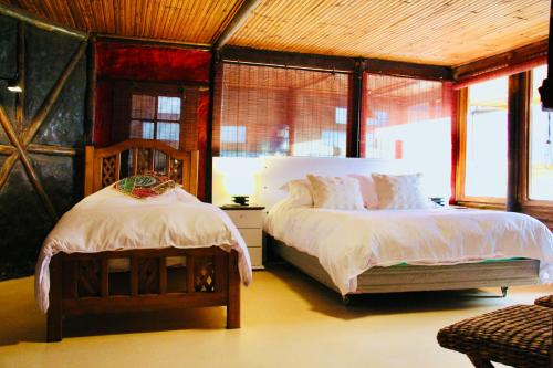 Postel nebo postele na pokoji v ubytování Loft de montaña El Quillay