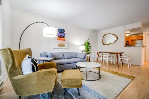 a living room with a couch and a table at Downtown Dream in Seattle