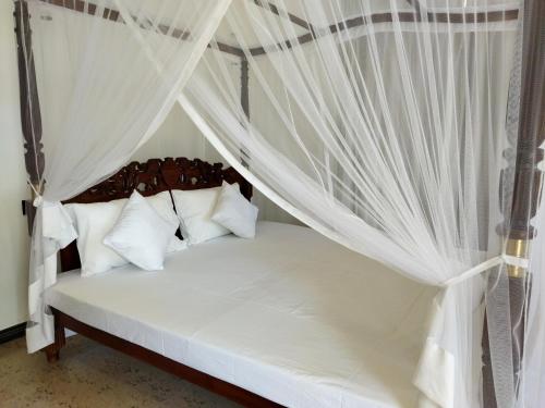 Postel nebo postele na pokoji v ubytování Mellow Villa