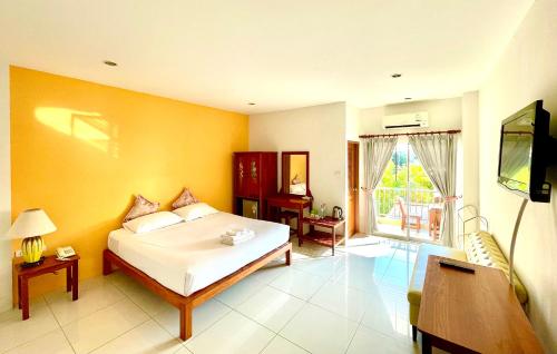 Postel nebo postele na pokoji v ubytování Smile Hua-Hin Resort - SHA Plus