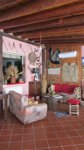 a living room with a couch and a table at Agriturismo Capuano in Gangi