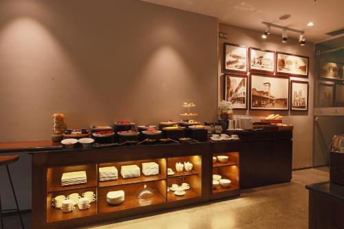 a display case in a store with food on it at CHERRY BOUTIQUE HOTEL in Ho Chi Minh City