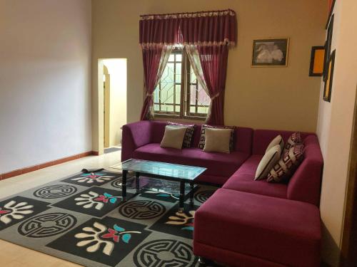 Гостиная зона в Flamboyan Homestay 1 Dieng Syariah RedPartner