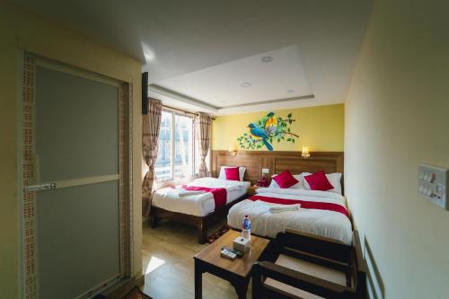 Krevet ili kreveti u jedinici u okviru objekta Hotel Royal Image