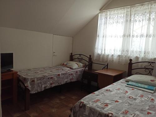 Cama o camas de una habitación en Prostor Guest House