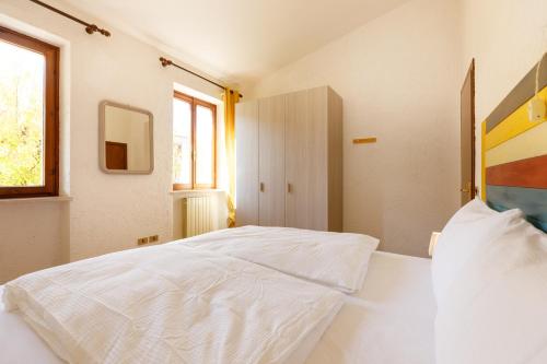 Cama o camas de una habitación en Residence Rustico