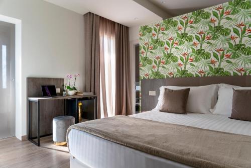 Postel nebo postele na pokoji v ubytování Civico25 Suite Hotel