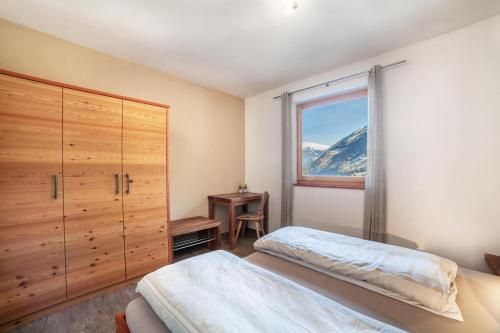 Postel nebo postele na pokoji v ubytování Chalet Ebnerhof