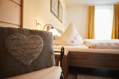 Letto o letti in una camera di Gasthof & Pension Steppacher