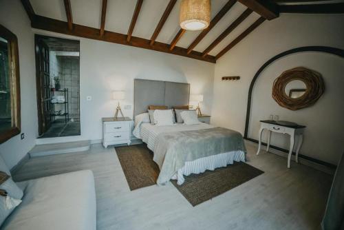 Tempat tidur dalam kamar di Casona de Tao